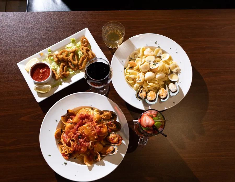 Calamari and seafood pasta plated at Bellini
