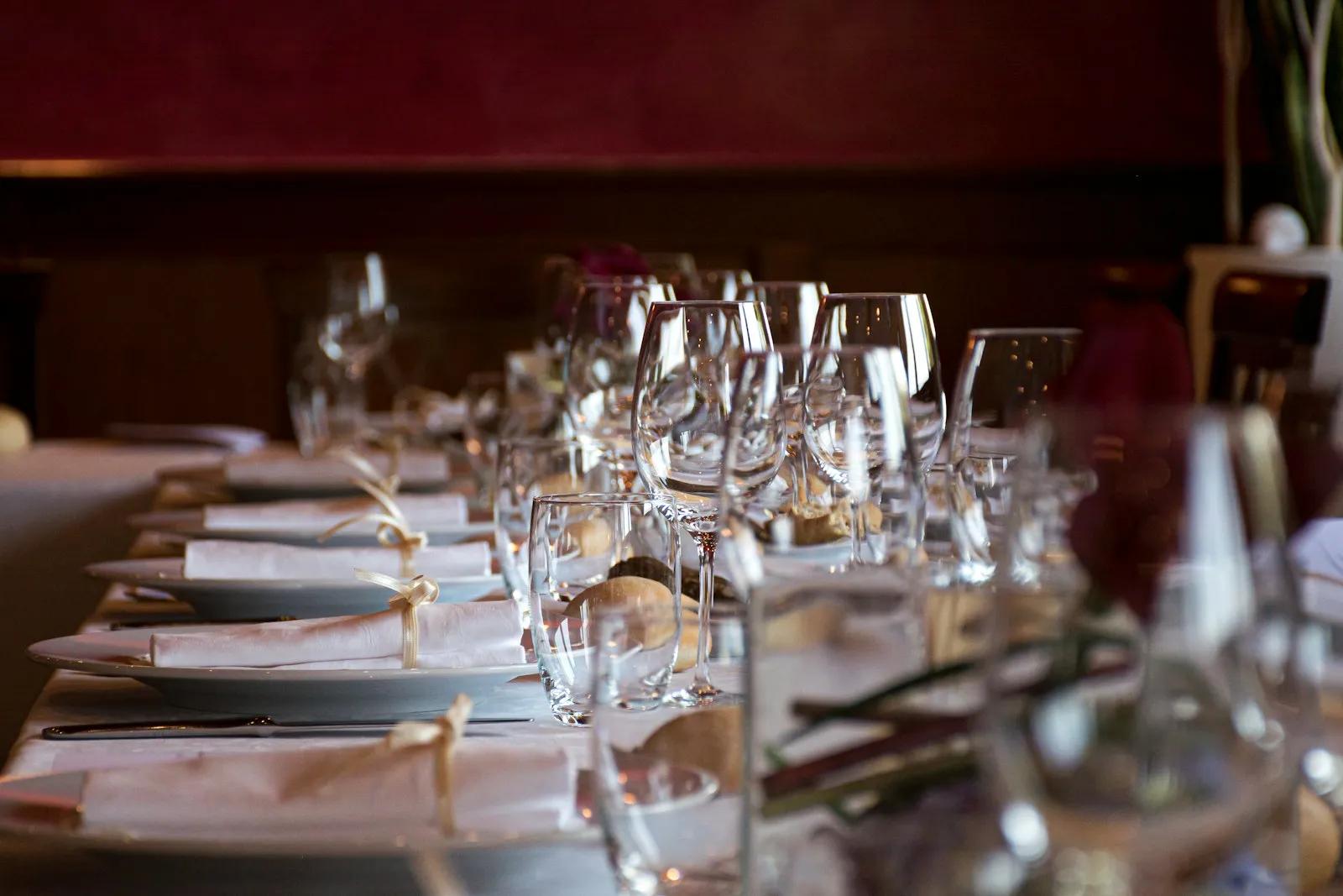 Wine glasses set at a table